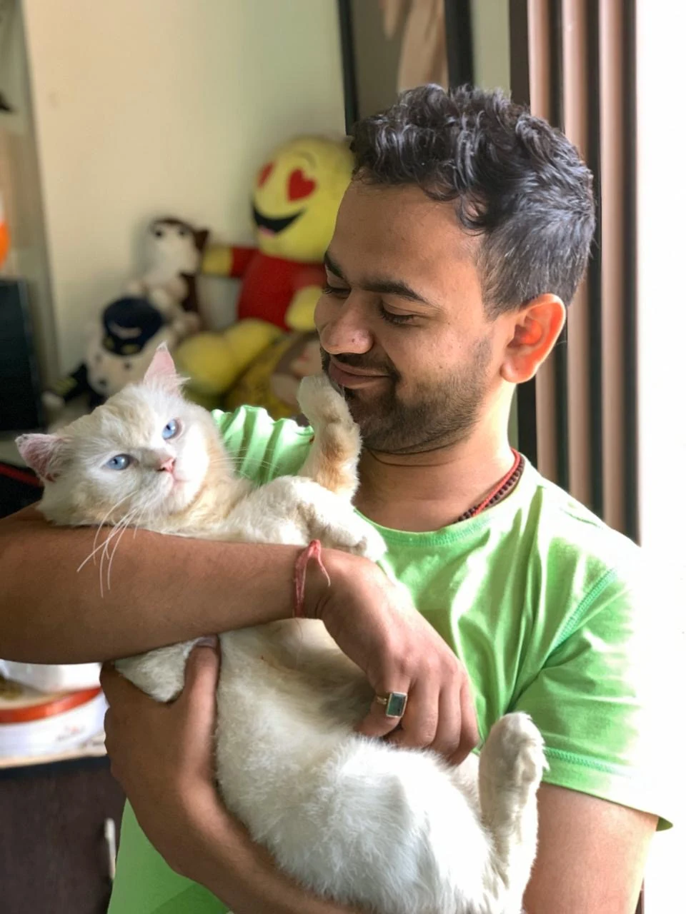 Vinamra holding a cat